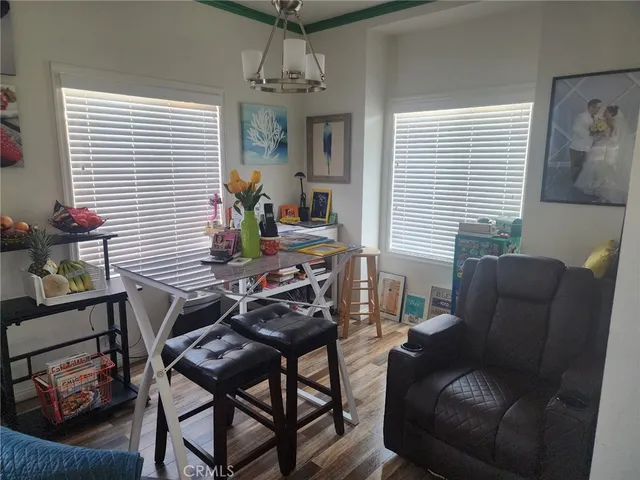 a work room with furniture and a window
