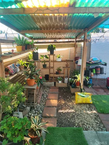 a view of swimming pool with outdoor seating