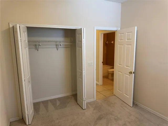 an empty room with closet