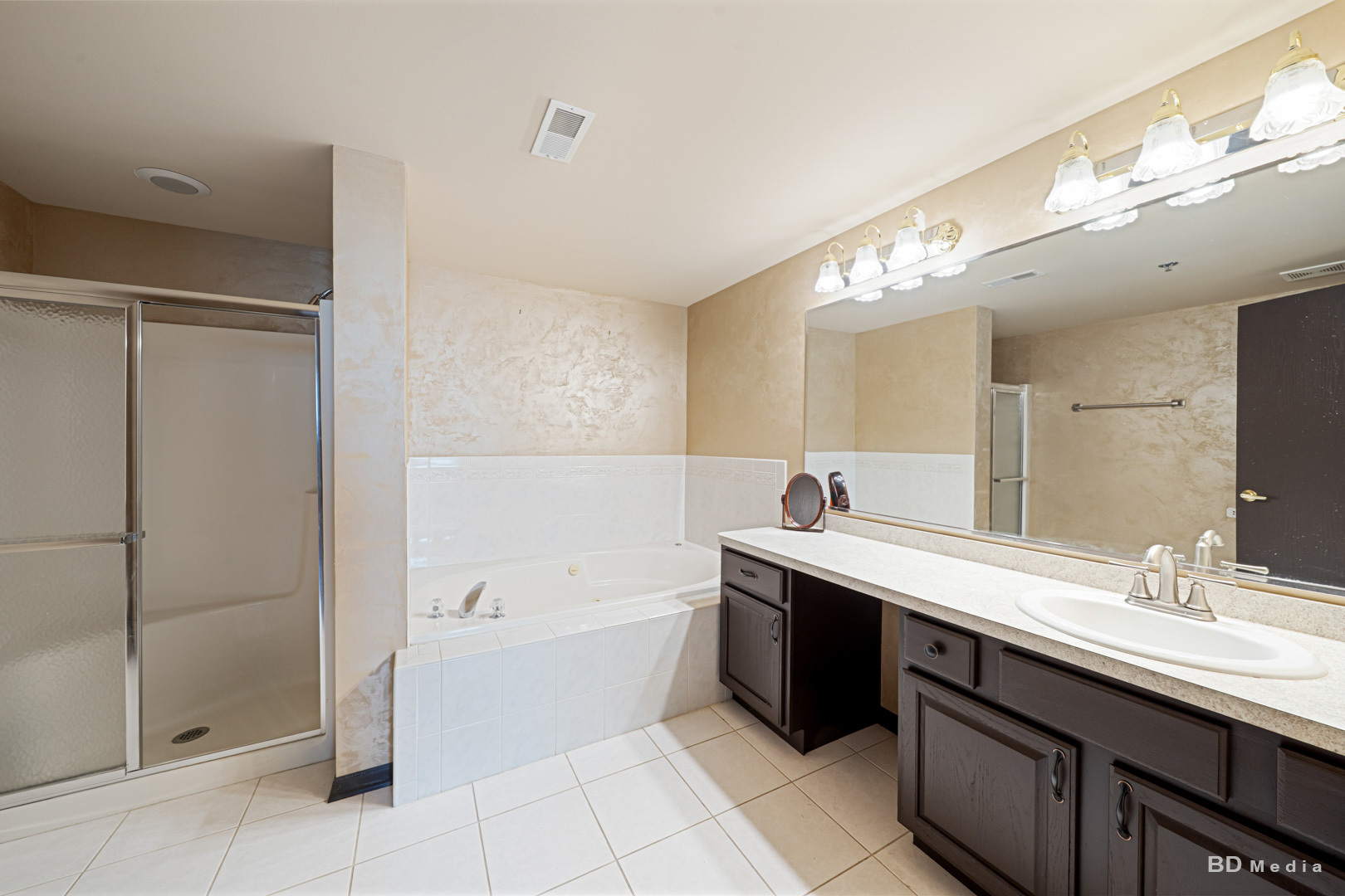 7928 Trinity Circle, Unit 2SW Tinley Park, IL 60487 - Photo 12 of 14 a spacious bathroom with a tub sink shower and mirror