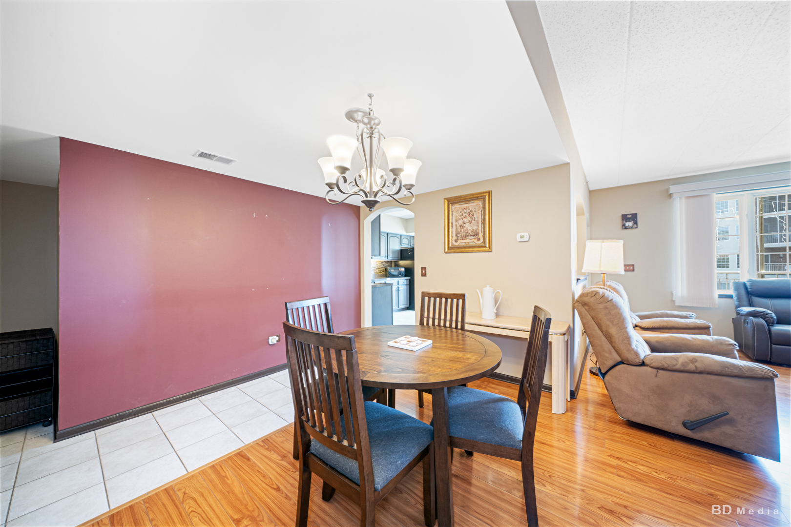 7928 Trinity Circle, Unit 2SW Tinley Park, IL 60487 - Photo 3 of 14 a view of a dining room with furniture and wooden floor