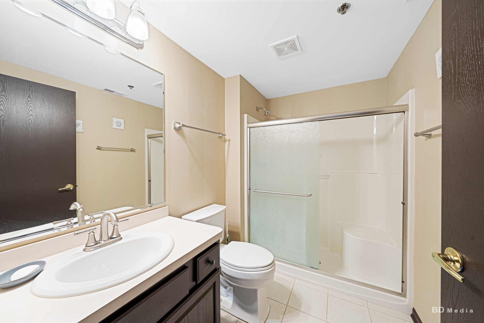 7928 Trinity Circle, Unit 2SW Tinley Park, IL 60487 - Photo 10 of 14 a bathroom with a sink toilet and shower