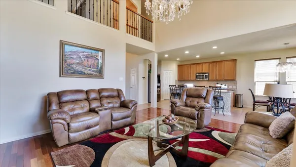 a view of a dining room with furniture and window