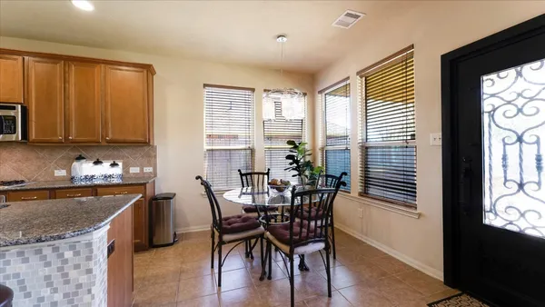 a view of a dining room with furniture