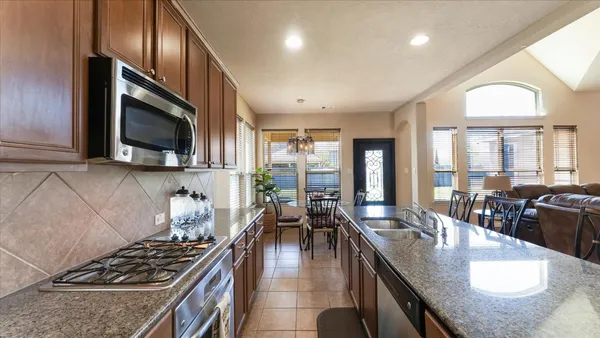 a bathroom with a sink toilet and mirror
