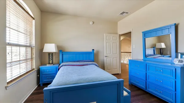 a bathroom with a sink vanity tub and shower