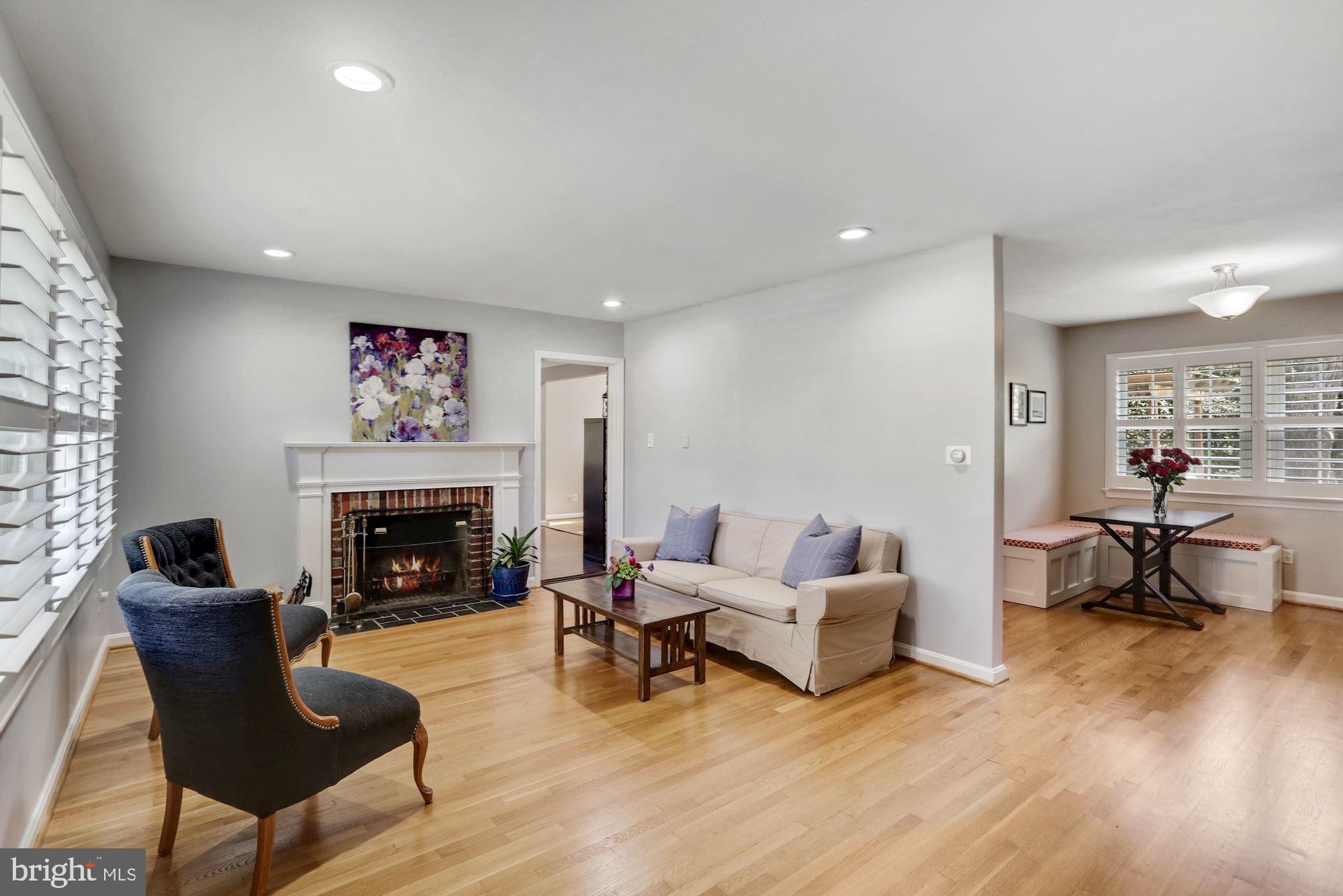8405 Fort Hunt Road Alexandria, VA 22308 - Photo 3 of 35 Living room with wood burning fireplace