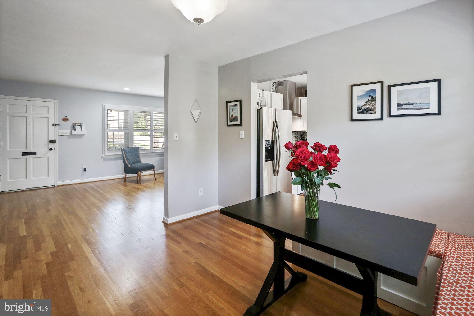 8405 Fort Hunt Road Alexandria, VA 22308 - Photo 4 of 35 Honey-hued hardwoods, recessed lighting