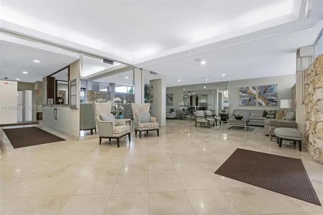 a view of a lobby with furniture and a livingroom