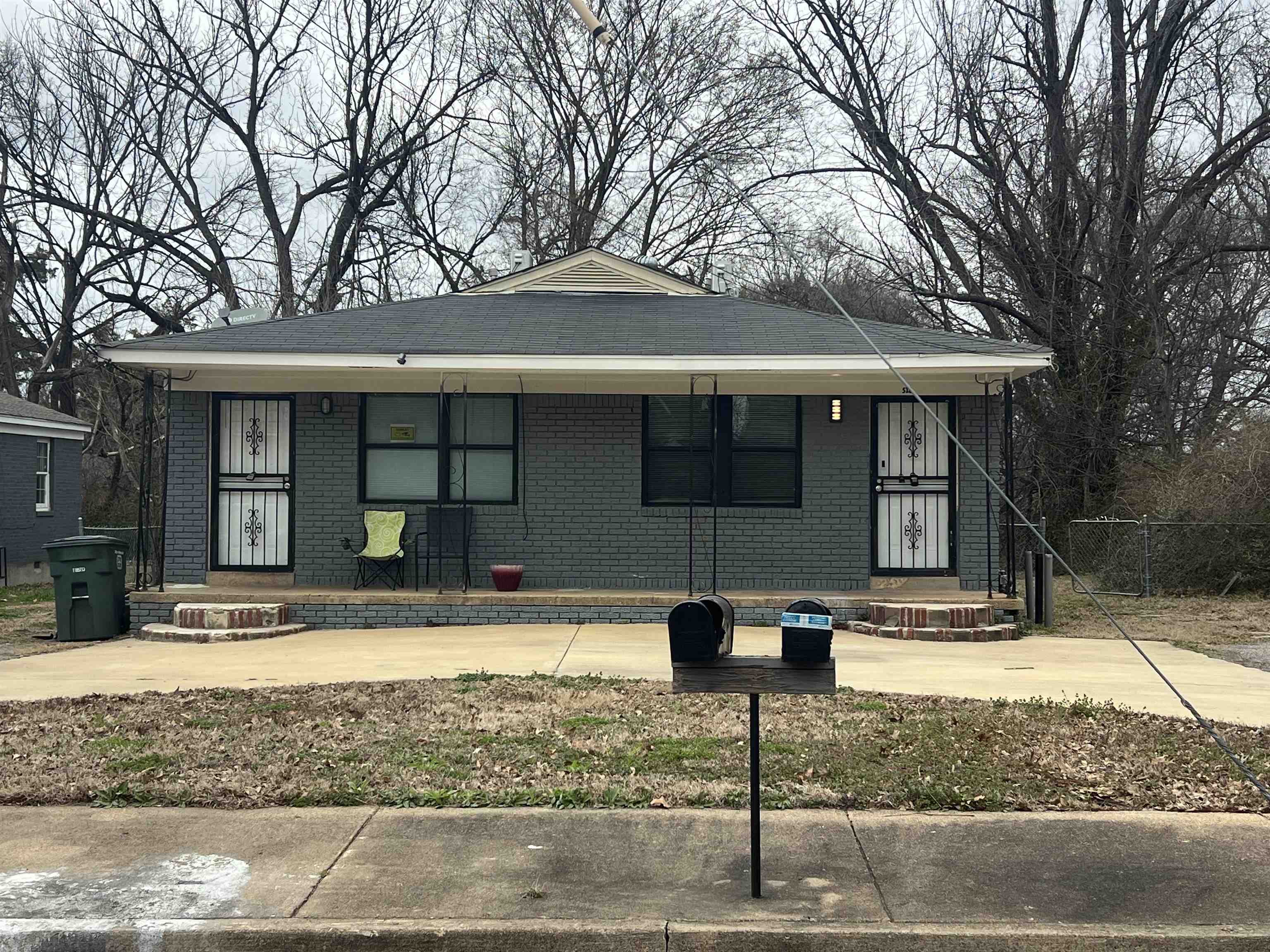 518 Harahan Road Memphis, TN 38109 - Photo 1 of 8 View of front of home featuring a porch and brick siding