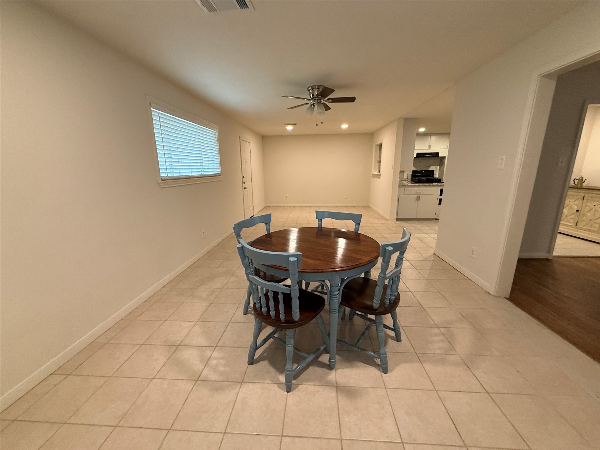 2310 Pecos La Marque, TX 77568 - Photo 12 of 26 a view of a dining room with furniture and wooden floor