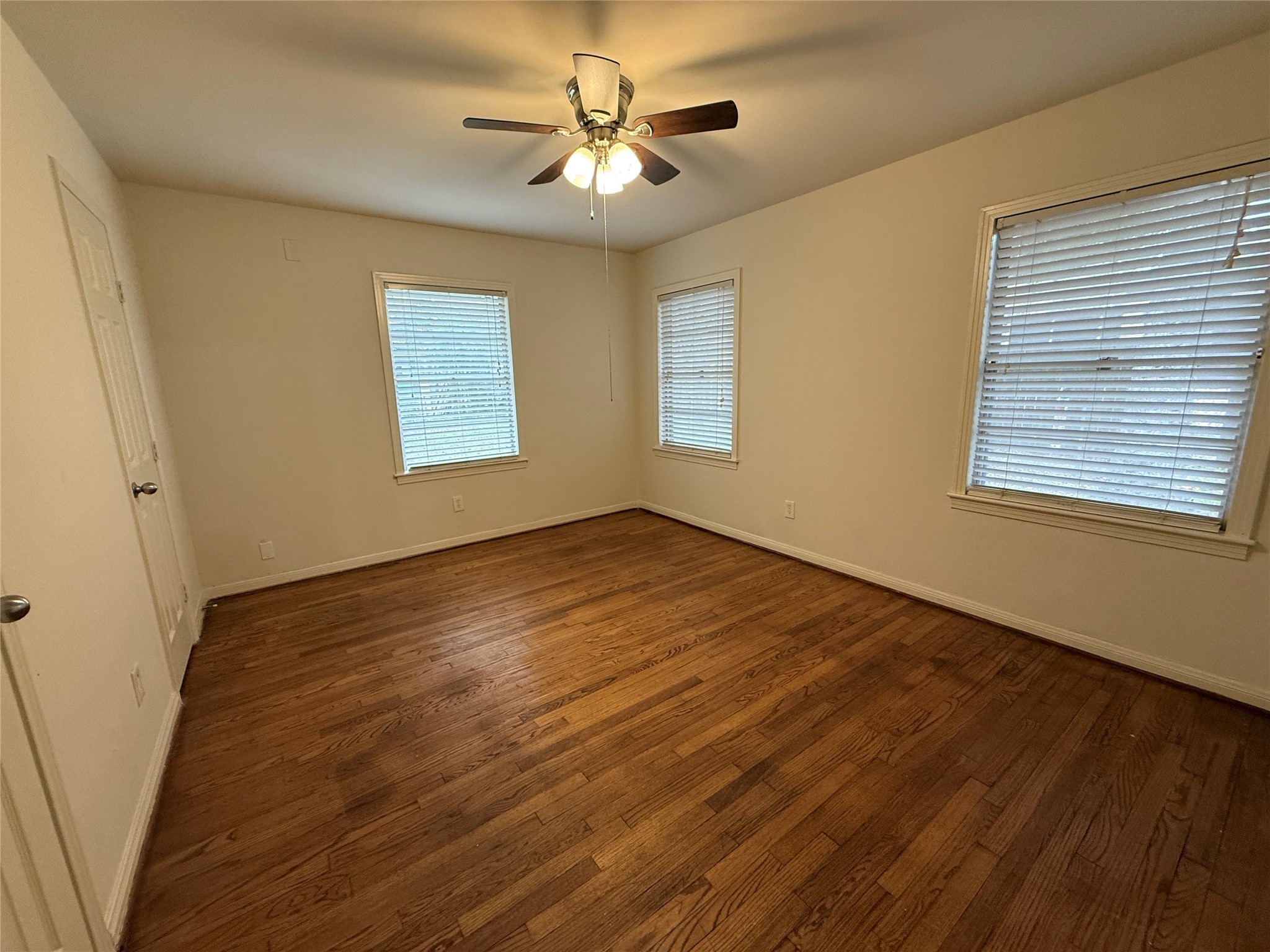 2310 Pecos La Marque, TX 77568 - Photo 20 of 26 a view of empty room with wooden floor and fan