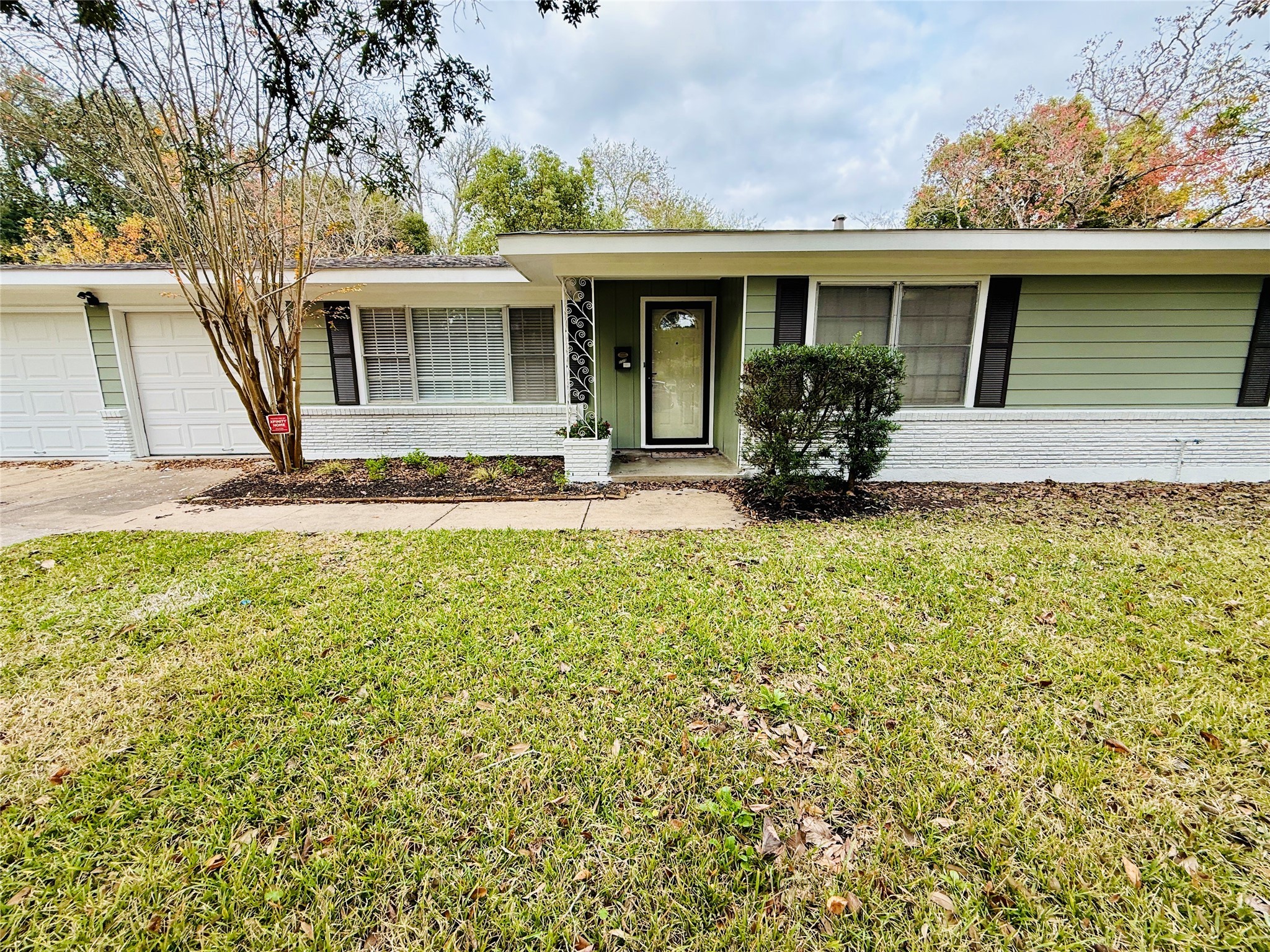 2310 Pecos La Marque, TX 77568 - Photo 4 of 26 a view of a house with backyard sitting area and garden