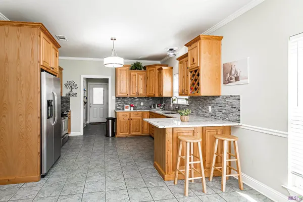 $310,000 | 32810 Poplar Court, Denham Springs, LA 70706