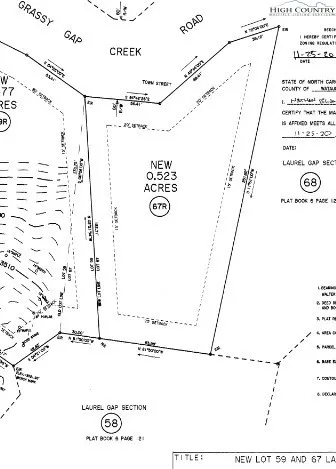 a view of a backyard with trees