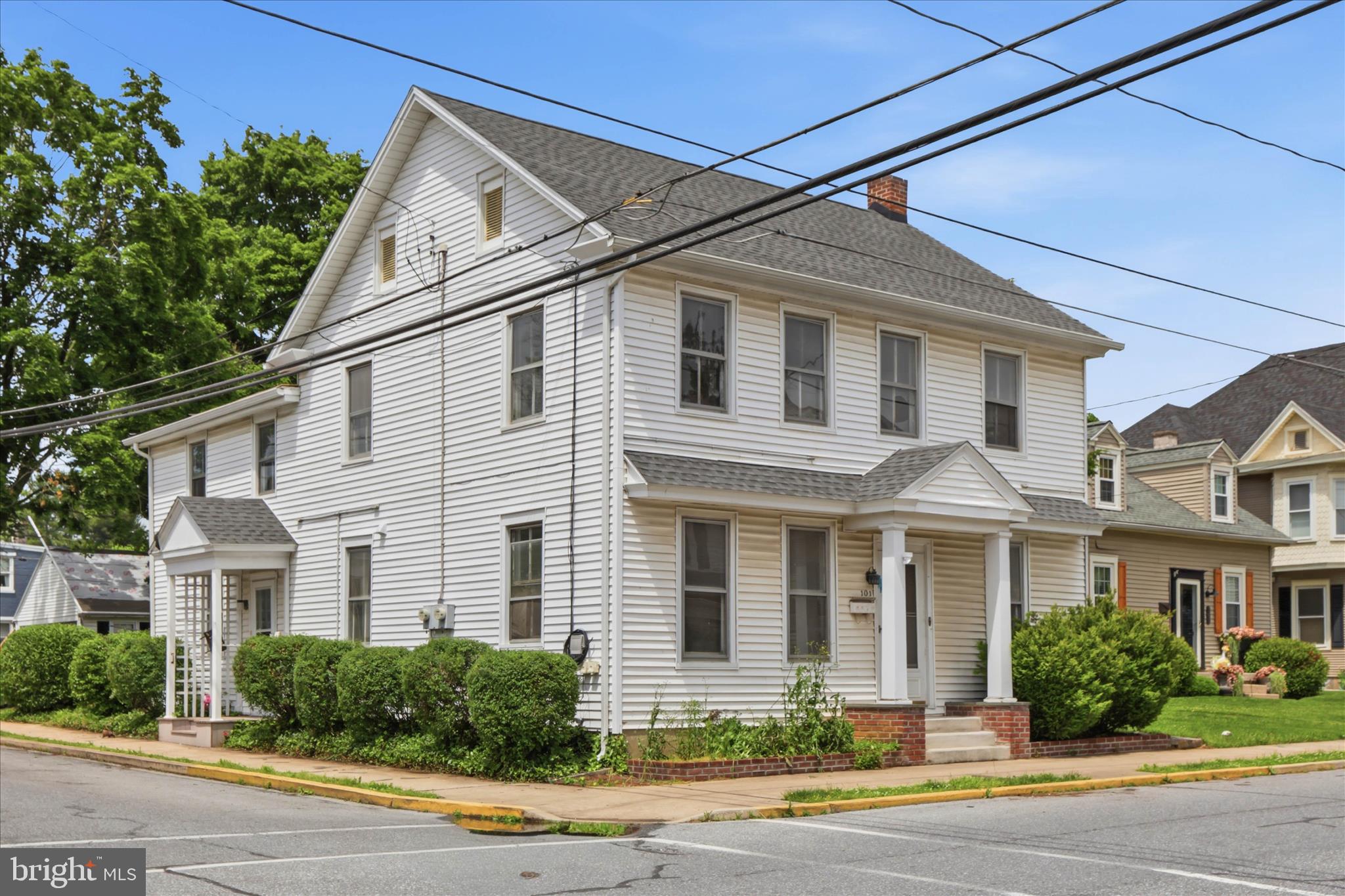 101 East Lincoln Avenue Lititz, PA 17543 - Photo 3 of 39 a front view of a house with a yard