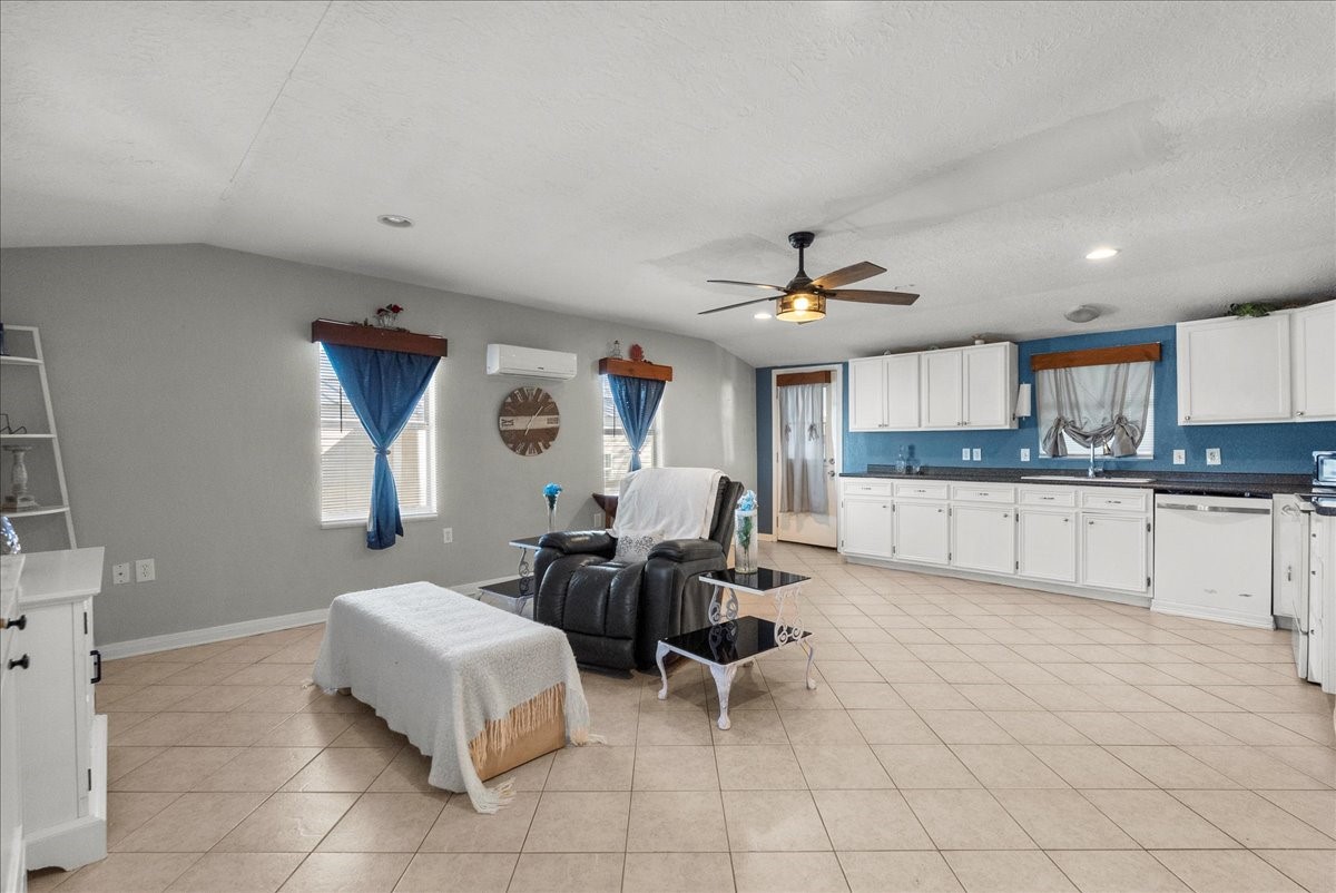 711 10th Street Dickinson, TX 77539 - Photo 5 of 33 Living room and dining room