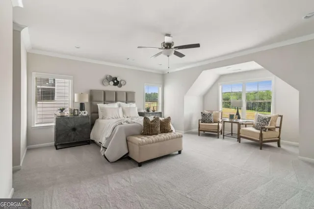 a bed room with furniture and a window