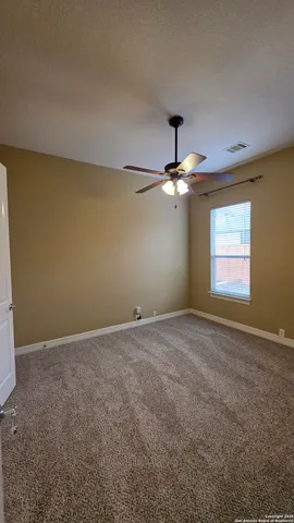 a view of an empty room with window