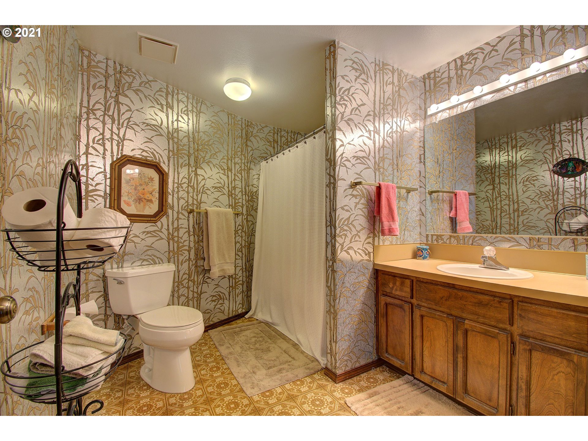 3408 Northeast 161st Street Ridgefield, WA 98642 - Photo 22 of 29 a bathroom with a toilet sink and mirror