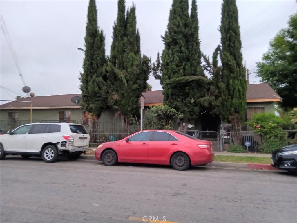 2506 East 130th Street Compton, CA 90222 - Photo 1 of 7 a view of a cars parked in front of a building