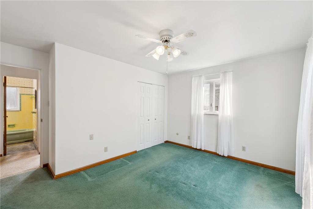 614 Maple Street Jeannette, PA 15644 - Photo 18 of 26 wooden floor in an empty room with a window