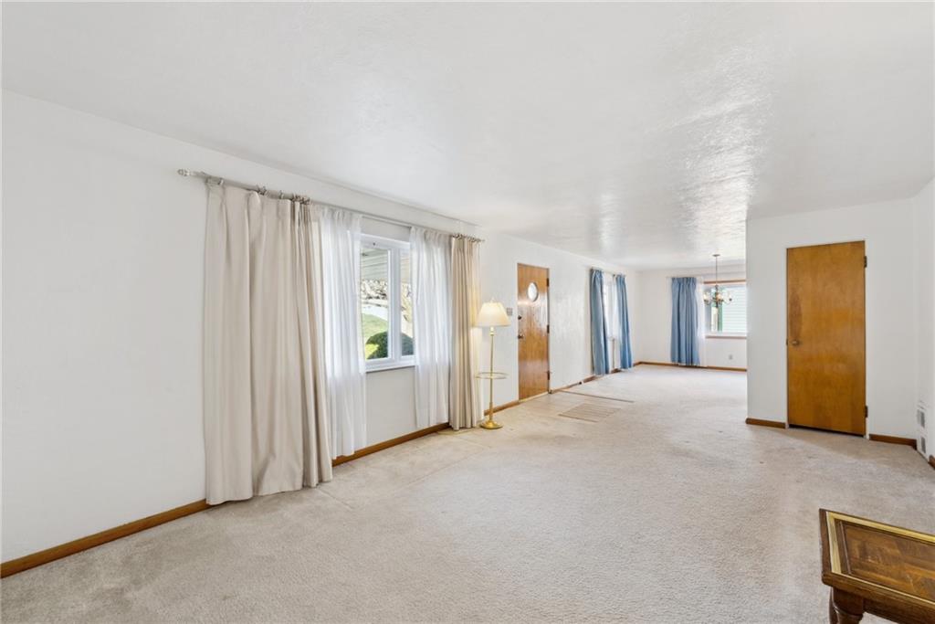 614 Maple Street Jeannette, PA 15644 - Photo 7 of 26 a view of an empty room with closet and a window