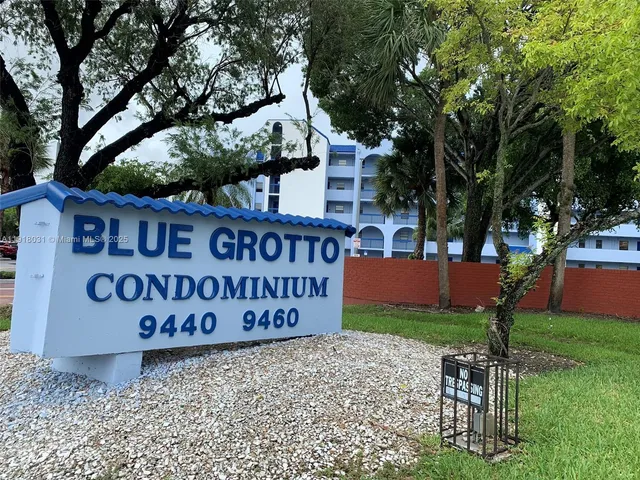 a view of outdoor space with garden and trees