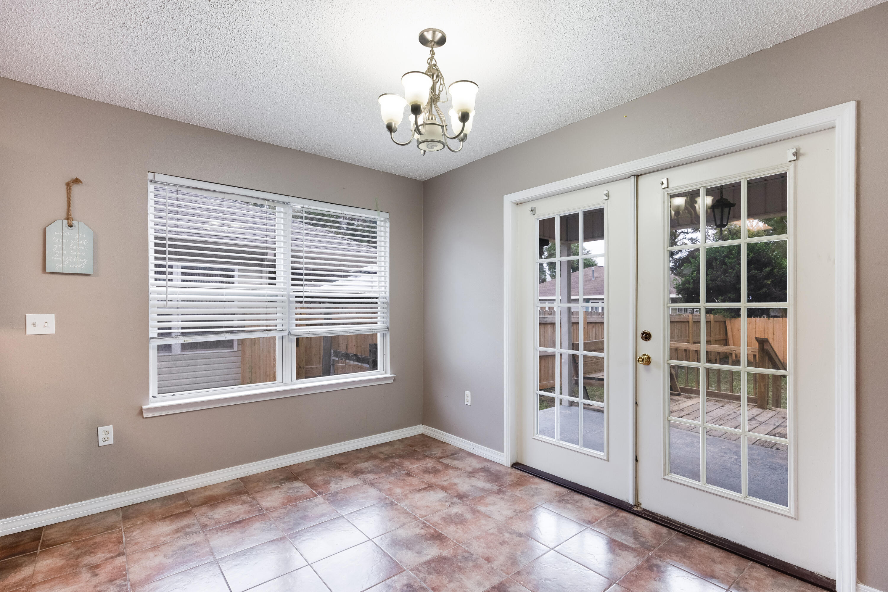 203 8th Avenue Crestview, FL 32536 - Photo 12 of 17 a view of an empty room with a window