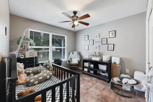 a living room with furniture and window