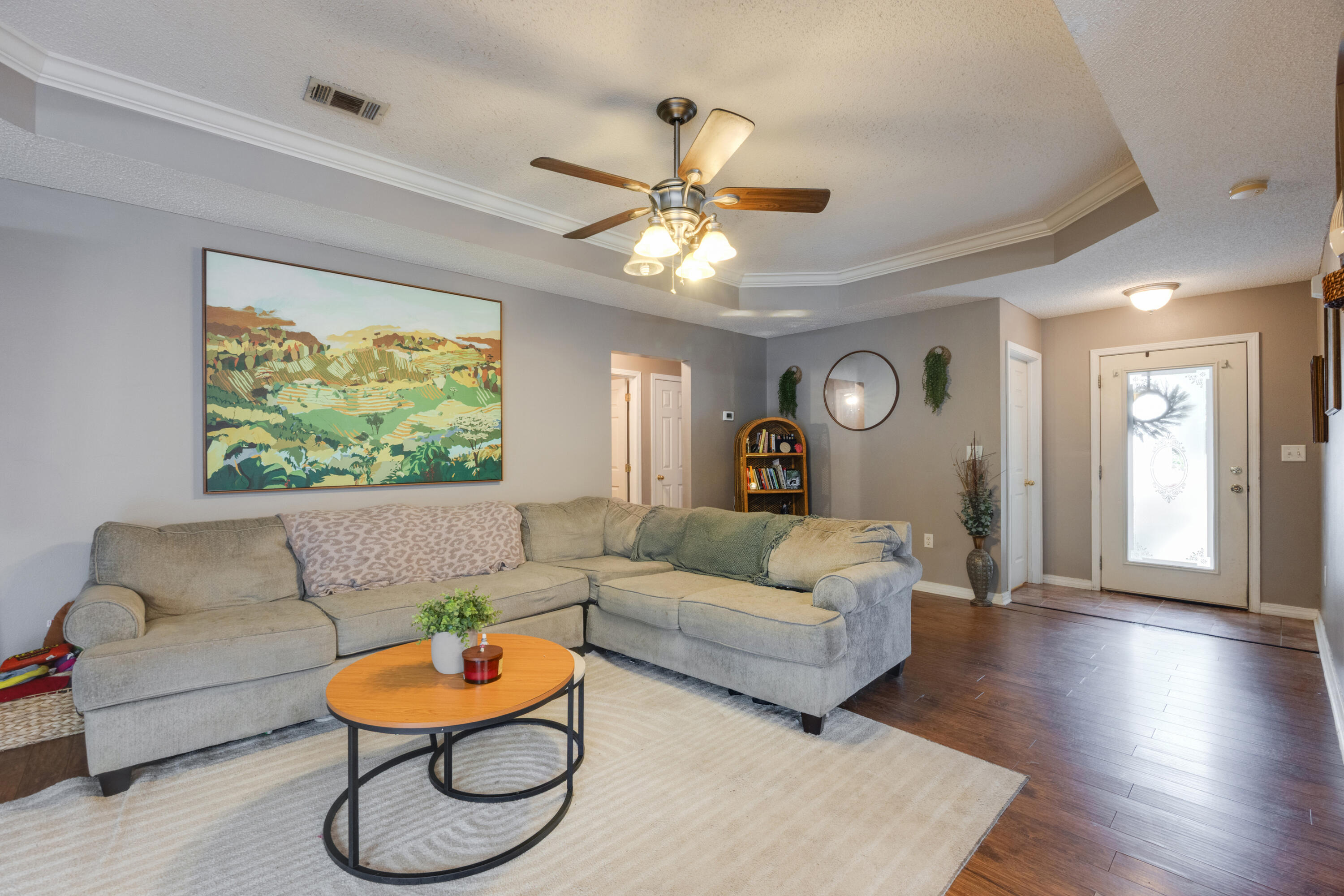 203 8th Avenue Crestview, FL 32536 - Photo 3 of 17 a living room with furniture and a large window