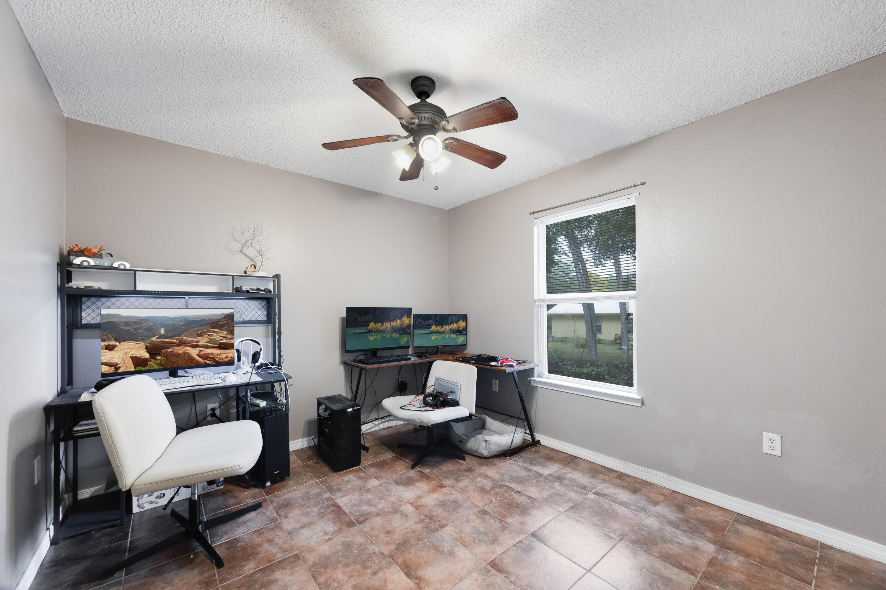 203 8th Avenue Crestview, FL 32536 - Photo 8 of 17 a living room with furniture and a window