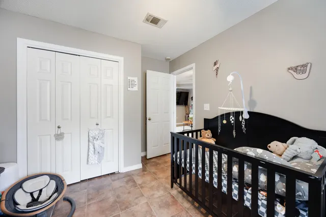 a view of a hallway with seating area