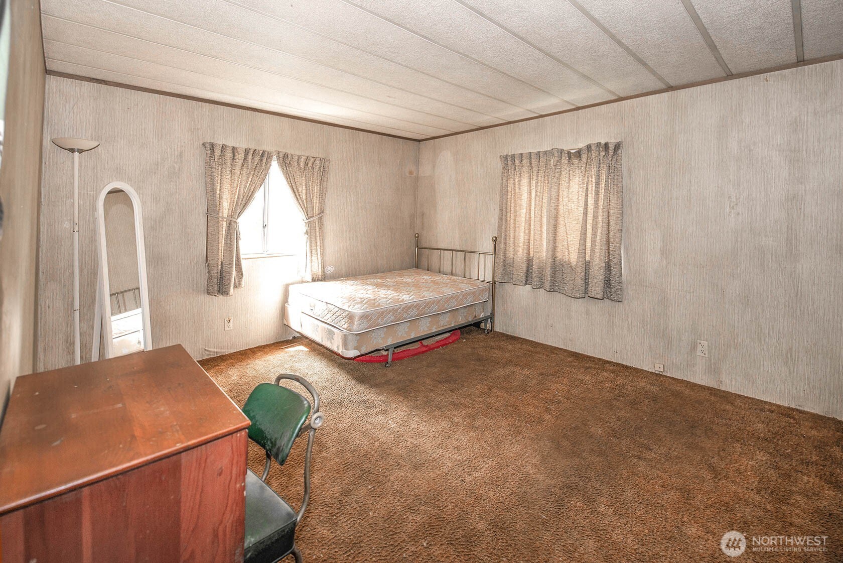 20115 49th Drive Southeast Bothell, WA 98012 - Photo 26 of 35 a bedroom with two beds and a window