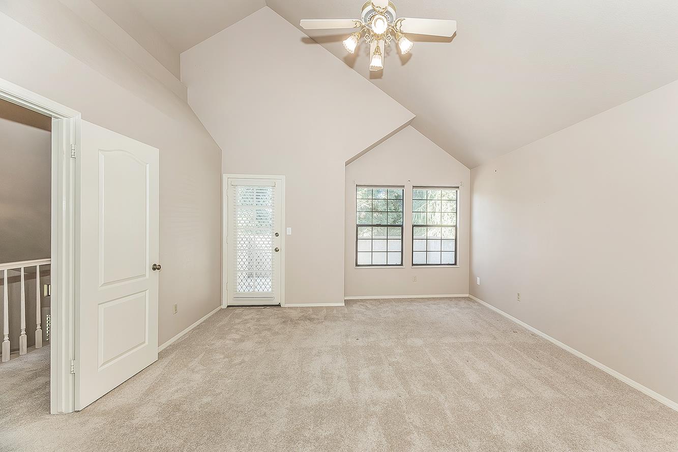 1282 West Flora Avenue Reedley, CA 93654 - Photo 16 of 49 a view of an empty room with a window
