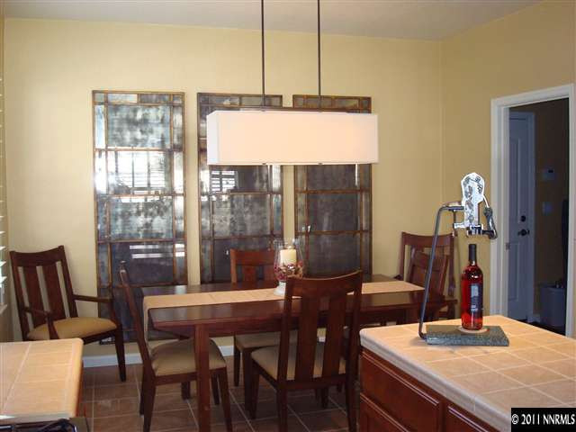 501 Martingale Court Reno, NV 89521 - Photo 5 of 13 a view of a dining room with furniture window and outside view