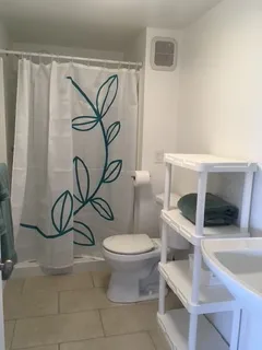 a bathroom with a toilet and a sink
