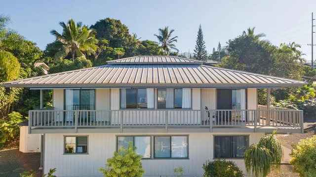a front view of a house with balcony
