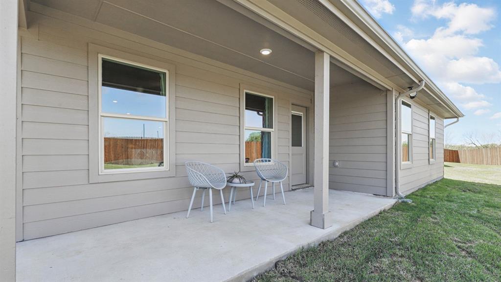 402 Blanco Drive Azle, TX 76020 - Photo 34 of 35 Patio-All Home and community information, including pricing, included features, terms, availability and amenities, are subject to change at any time without notice or obligation. All Drawings, pictures, photographs, video, square footages, floor plans, elevations, features, colors and sizes are approximate for illustration purposes only and will vary from the homes as built.