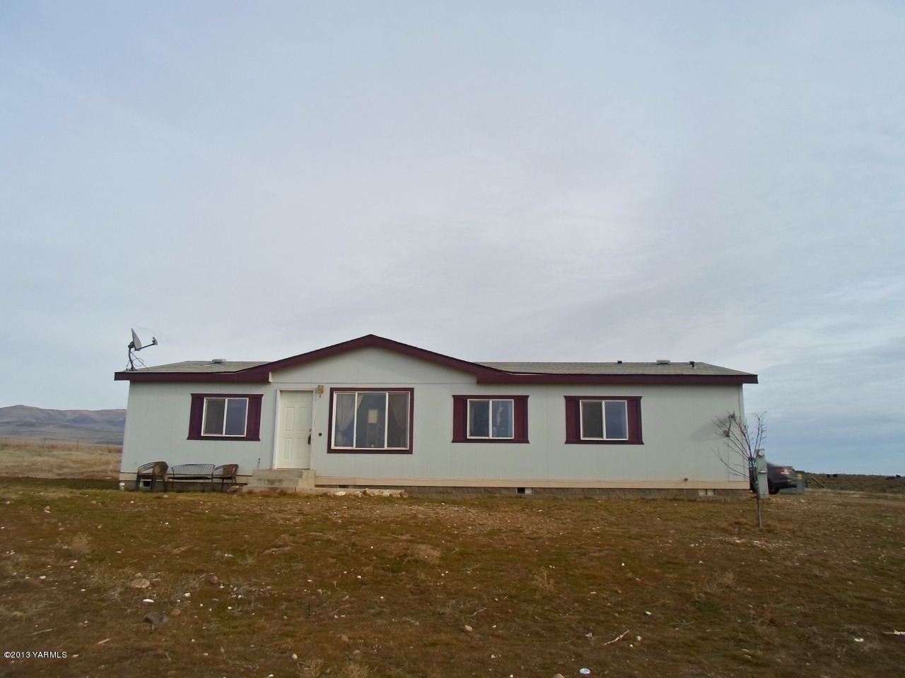 11533 Mieras Road Yakima, WA 98901 - Photo 22 of 37 a house with trees in front of it