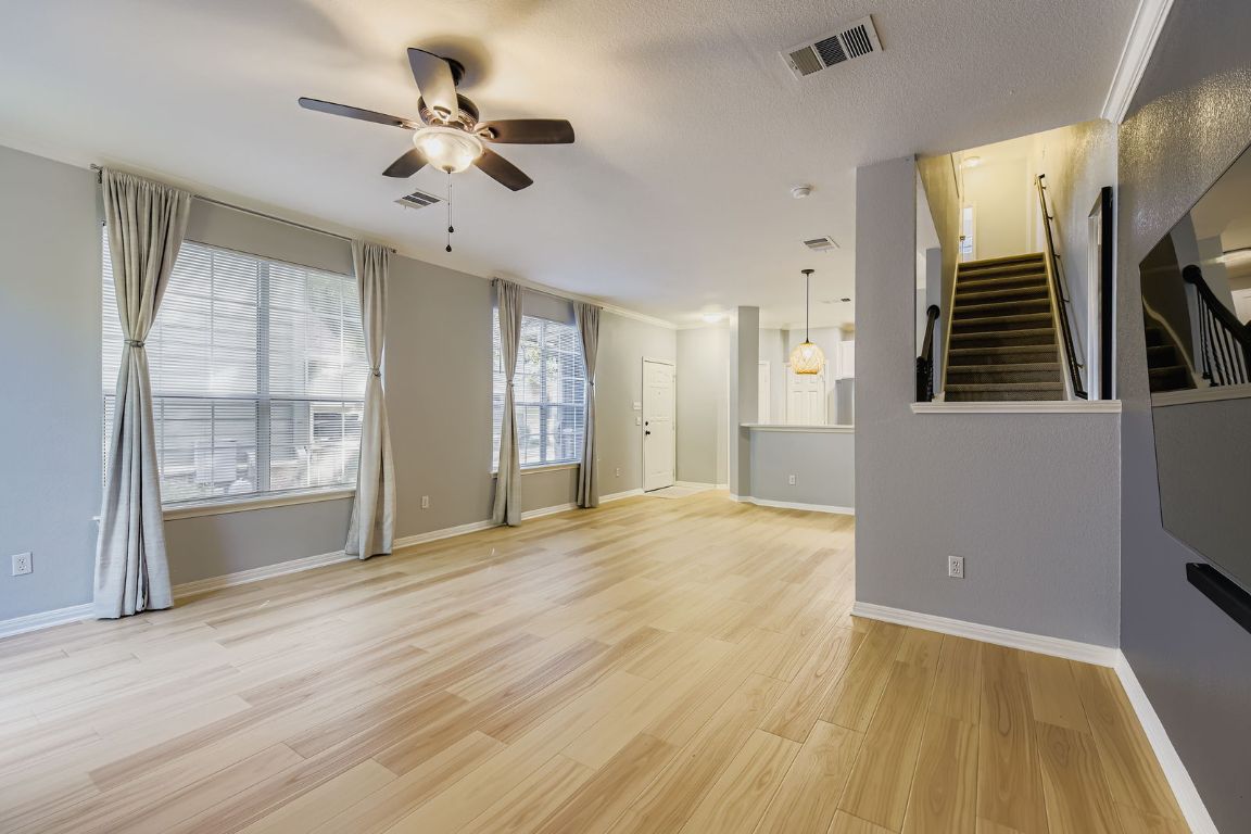 8518 Cahill Drive, Unit 20 Austin, TX 78729 - Photo 8 of 36 a view of an empty room with a window