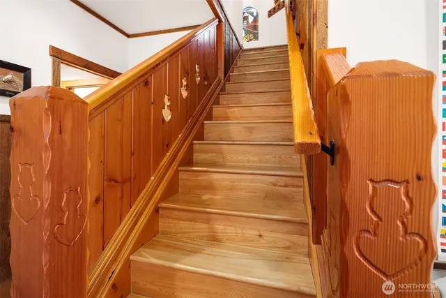 a kitchen with stainless steel appliances granite countertop a refrigerator a sink a stove and island