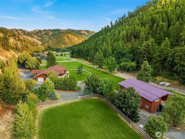 a view of a garden with a houses