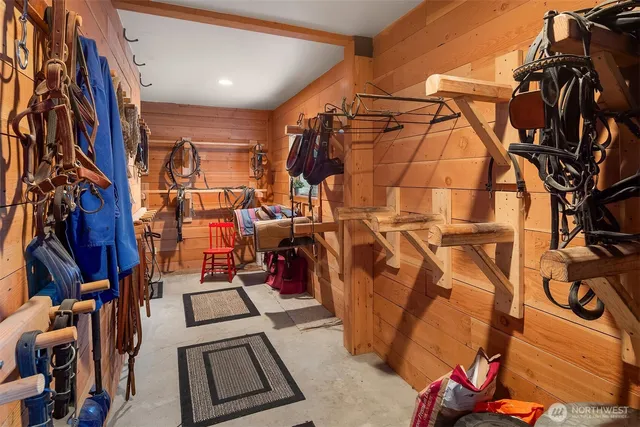 a view of a backyard with table and chairs and potted plants