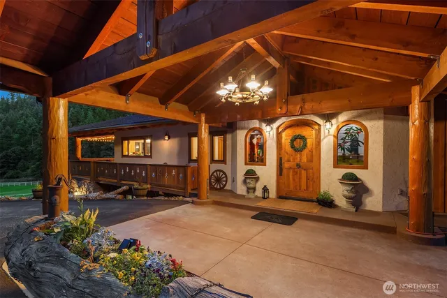 a hallway with sliding door and wooden floor