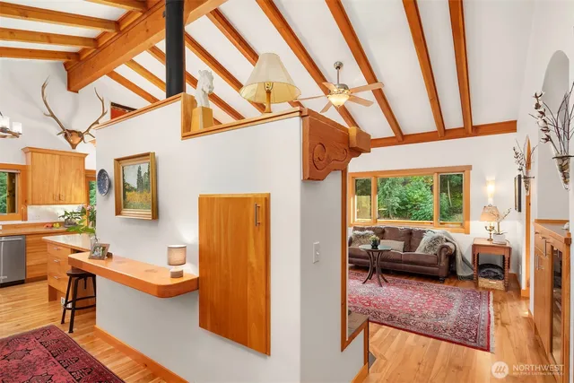 a kitchen with a sink and a large window