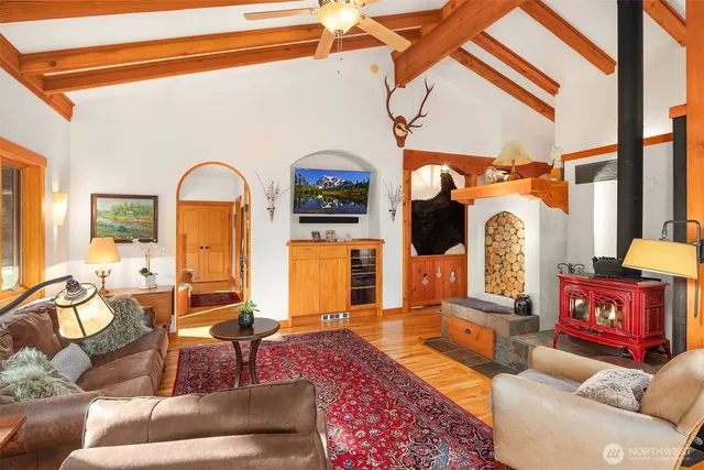 a view of a patio with table and chairs