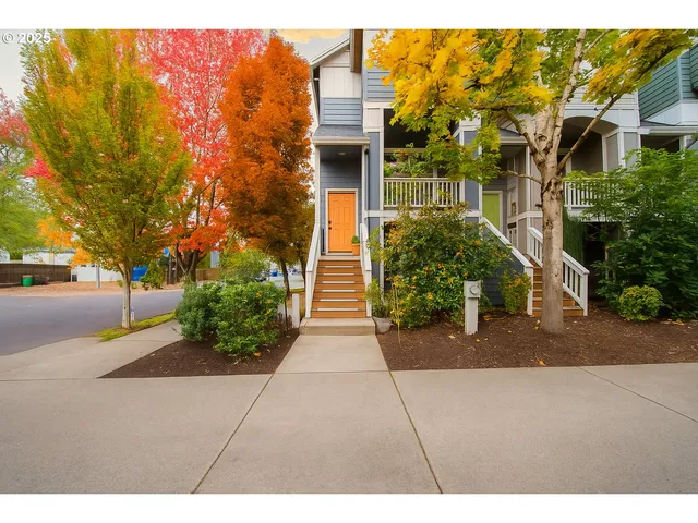 a backyard of a house with plants