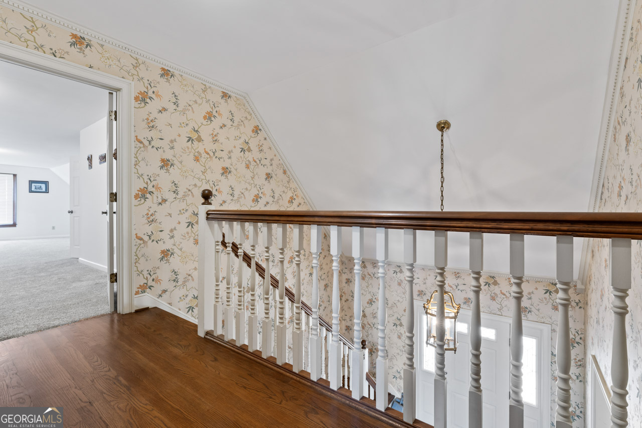 2940 East Lake Road McDonough, GA 30252 - Photo 29 of 47 a view of a hallway with wooden floor and entryway