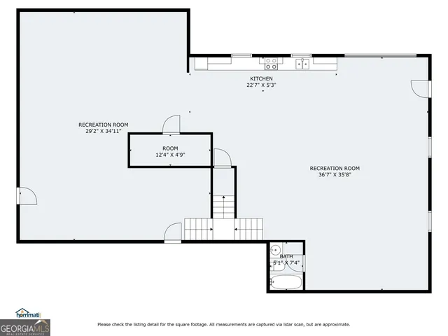 a picture of a bathroom with a shower